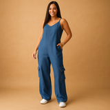 Denim jumpsuit with V-neck and open back for women.