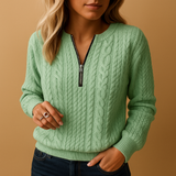 Casual knitted women's sweater with round neck and texture.