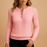 Casual knitted women's sweater with round neck and texture.