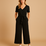 Casual jumpsuit with short sleeves and lace-up closure for women.