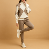 Comfortable loungewear set with sweater and sweatpants for women.