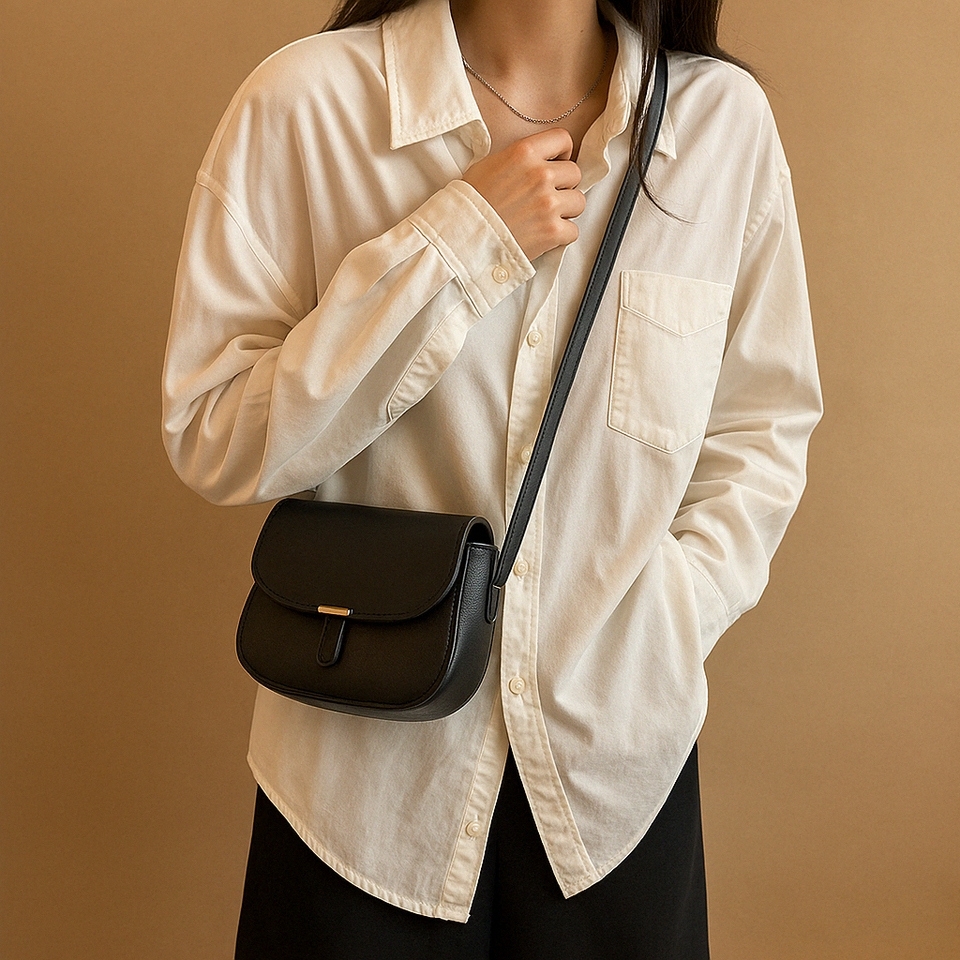 Compact crossbody bag with timeless design for women.