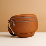 Crossbody bag with double zipper and timeless design for women.
