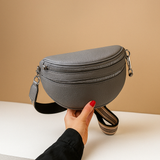 Crossbody bag with double zipper and timeless design for women.