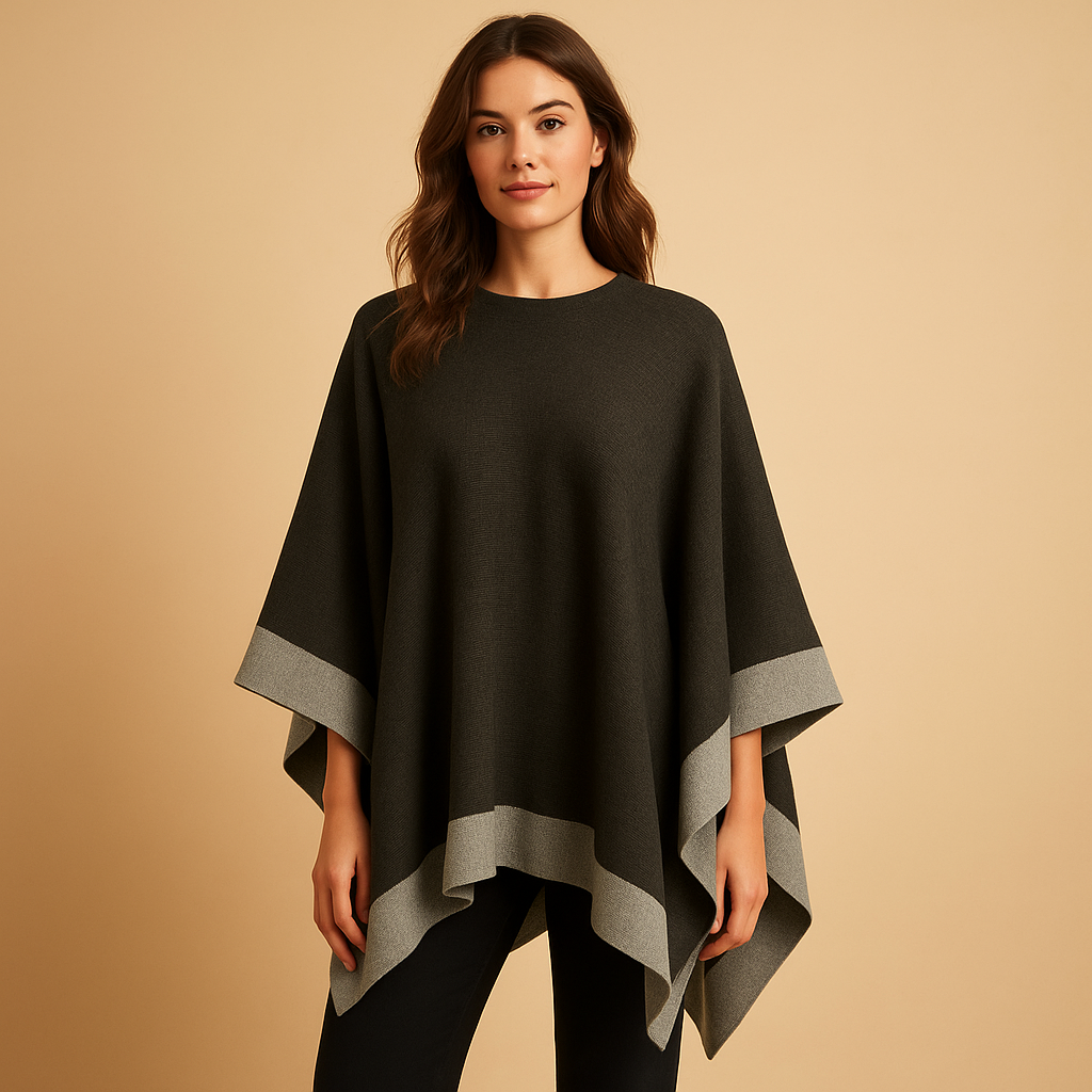 Elegant women's poncho with open sides and a flowing fit.
