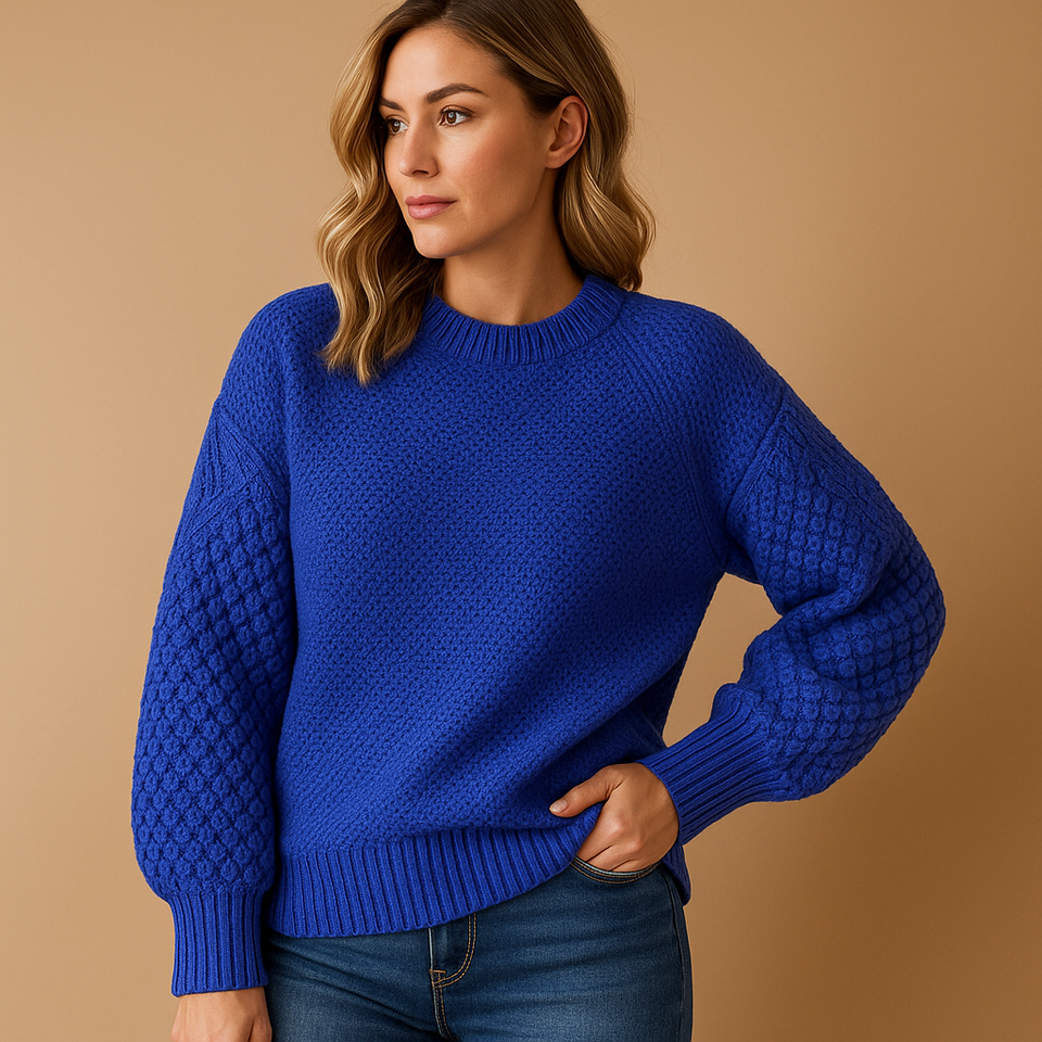 Elegant women's sweater made from soft knit fabric with a timeless fit.