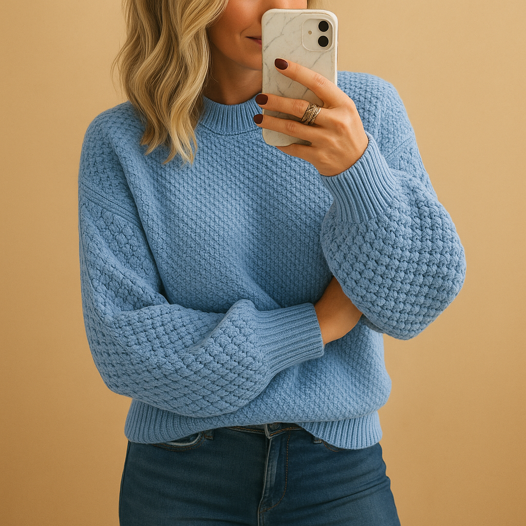 Elegant warm sweater with a comfortable fit for women.