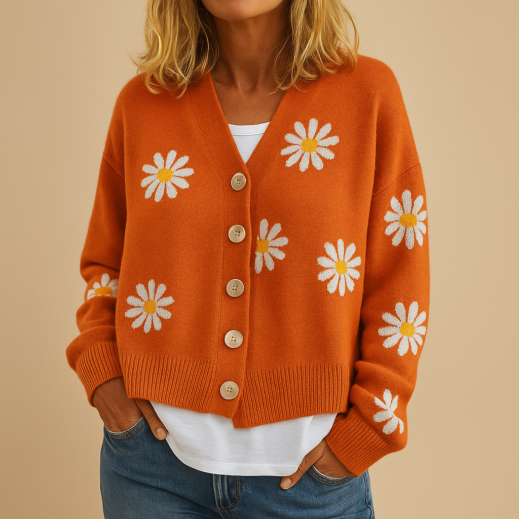 Knitted women's cardigan with floral pattern and button closure.
