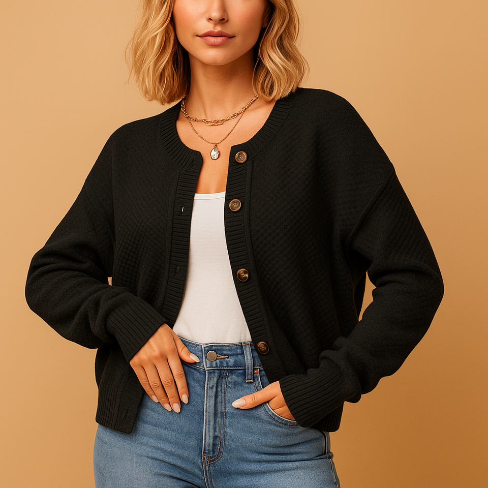 Knitted women's cardigan with buttons.