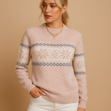 Knitted turtleneck sweater with snowflakes for women.