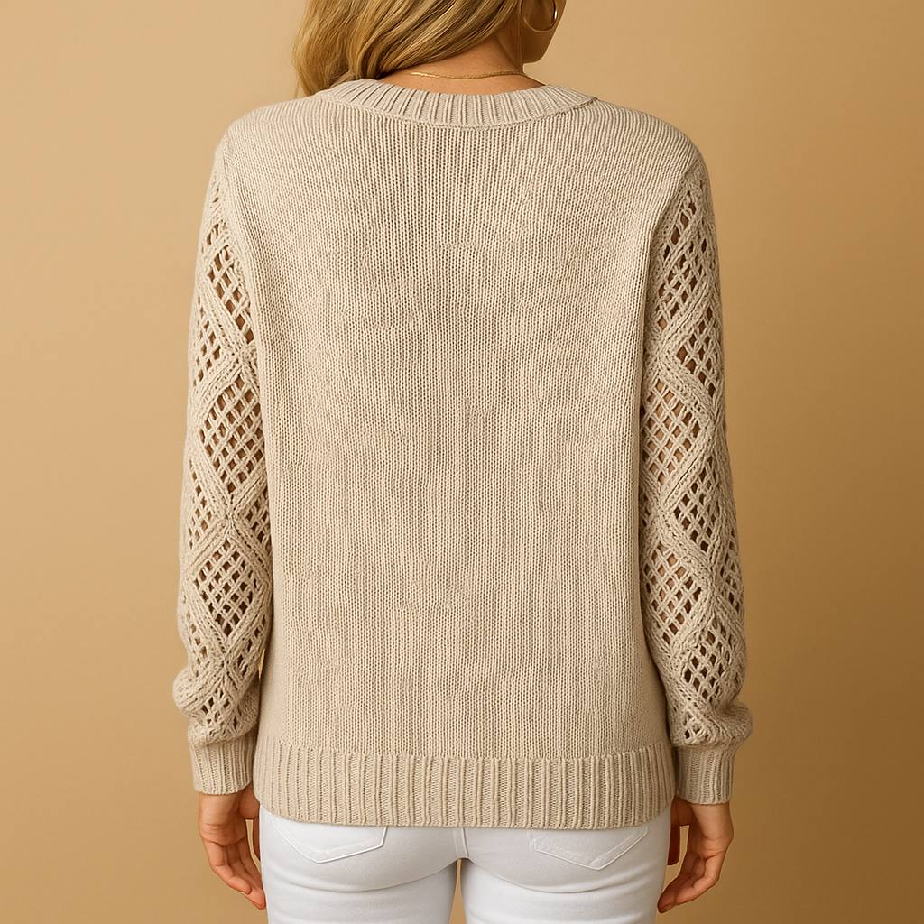 Knitted women's sweater with openwork pattern.