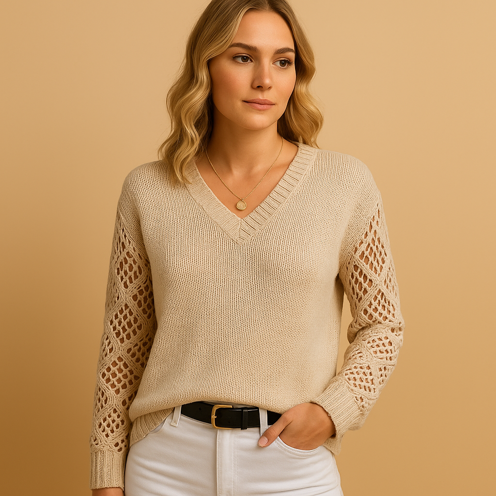 Knitted women's sweater with openwork pattern.