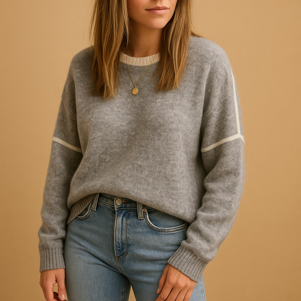 Knitted women's sweater with round neck.