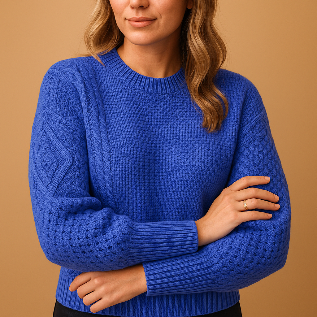 Knitted women's sweater with round neck.