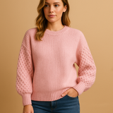 Knitted women's sweater with round neck.