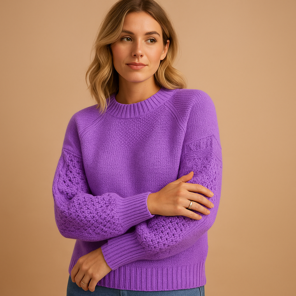 Knitted women's sweater with round neck.