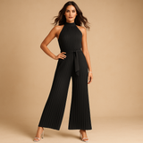 Elegant pleated jumpsuit with wide legs for women.