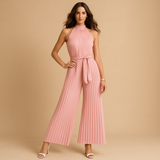 Elegant pleated jumpsuit with wide legs for women.