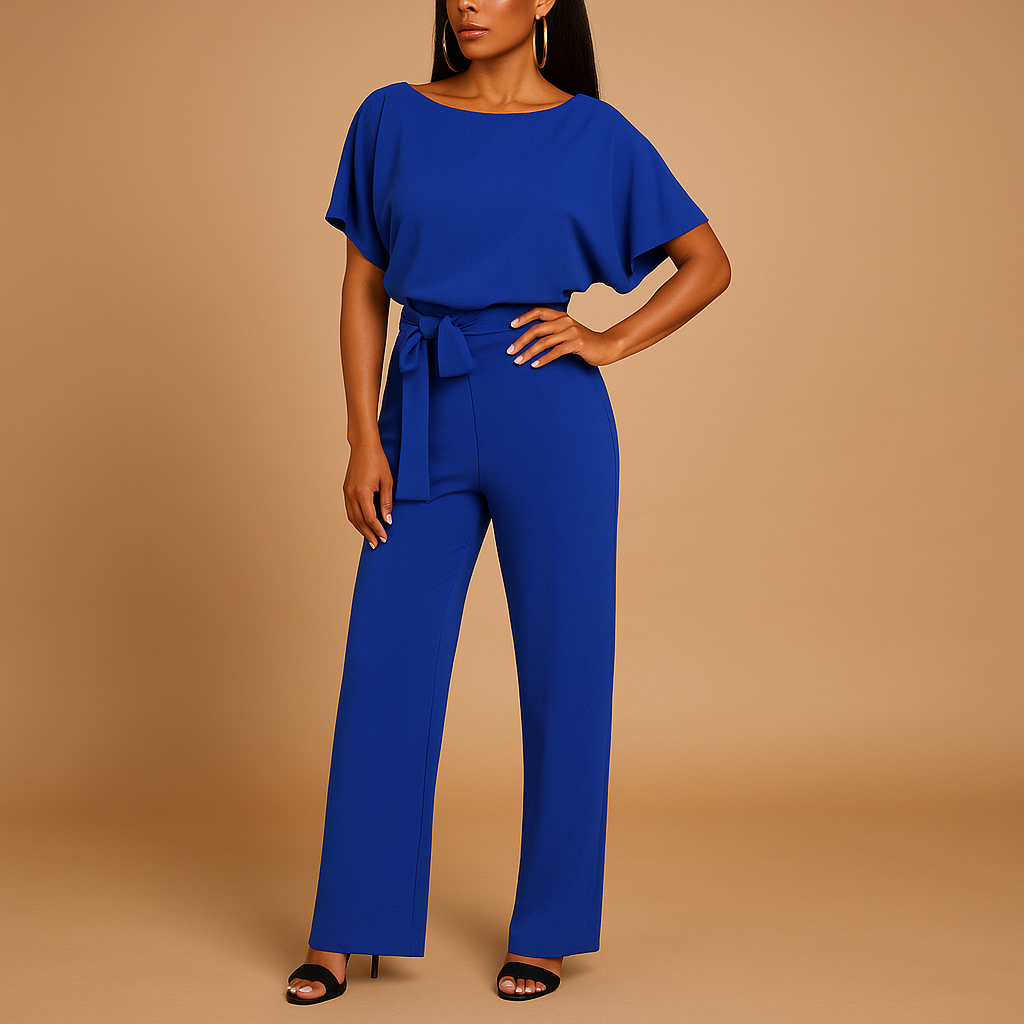 Glitter jumpsuit with halter neck and open back for women.