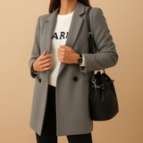 Long, elegant women's jacket with a classic cut