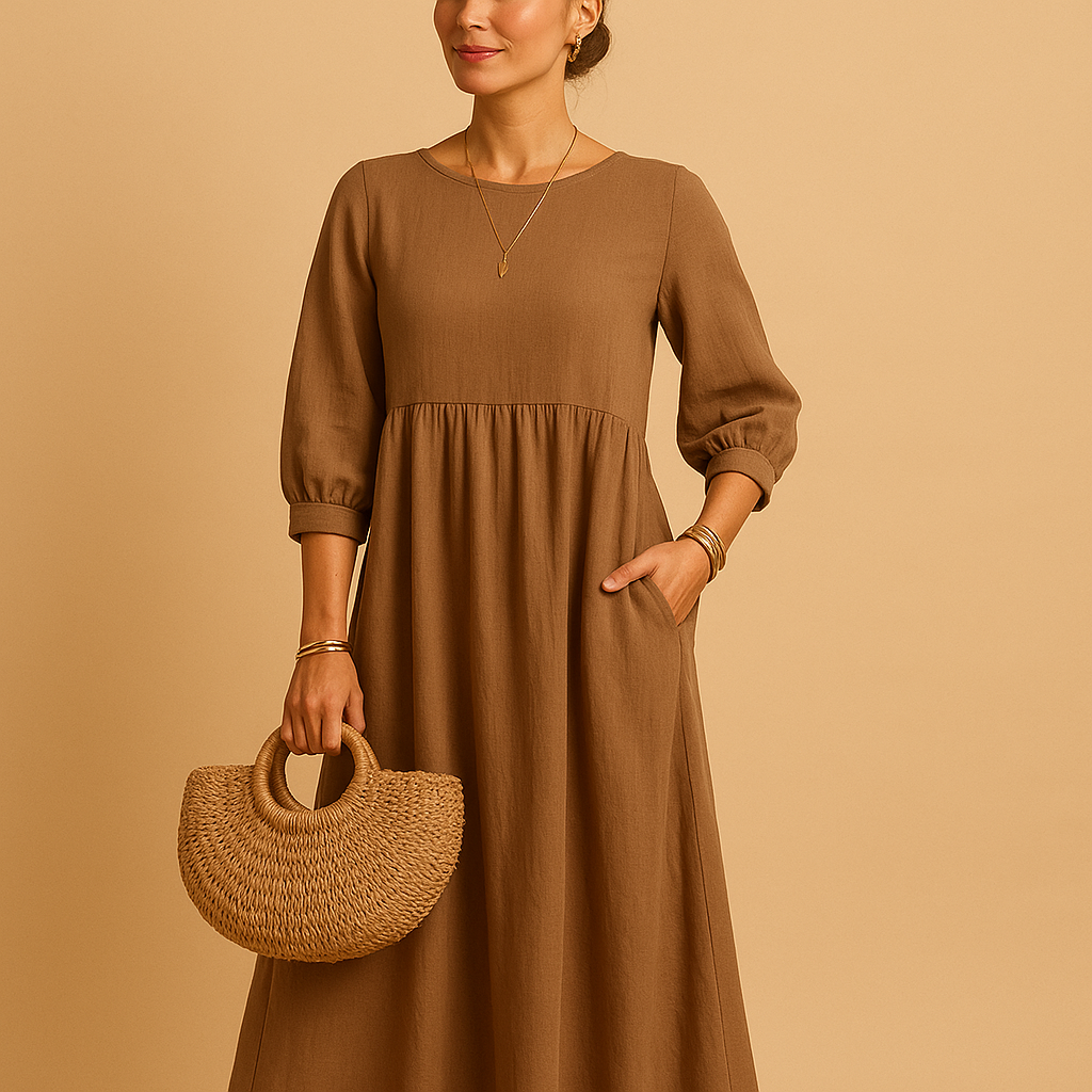 Long plain women's dress with round neckline.