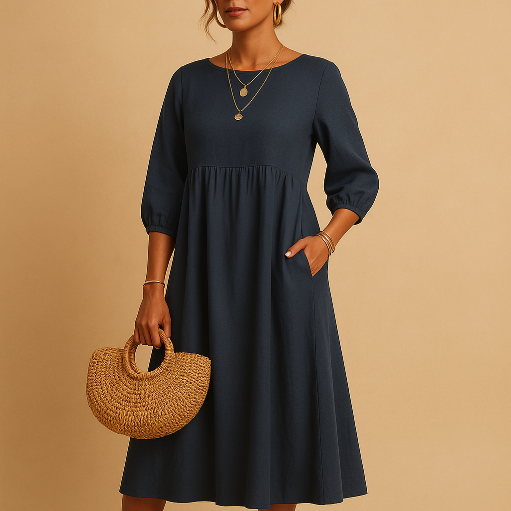 Long plain women's dress with round neckline.