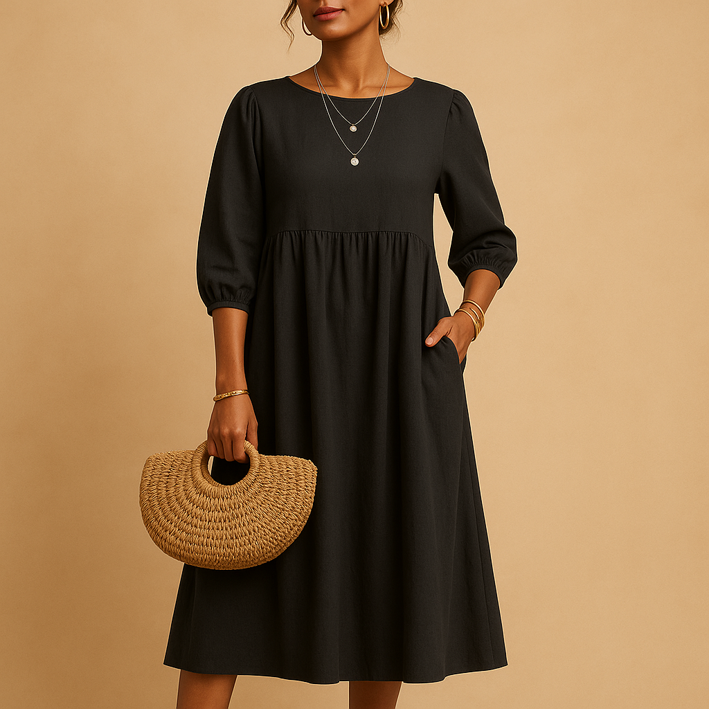 Long plain women's dress with round neckline.