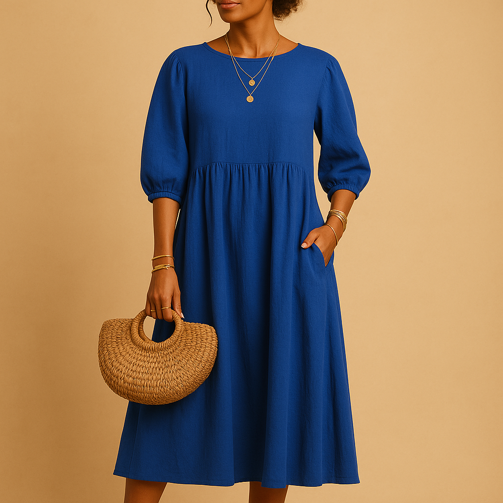 Long plain women's dress with round neckline.