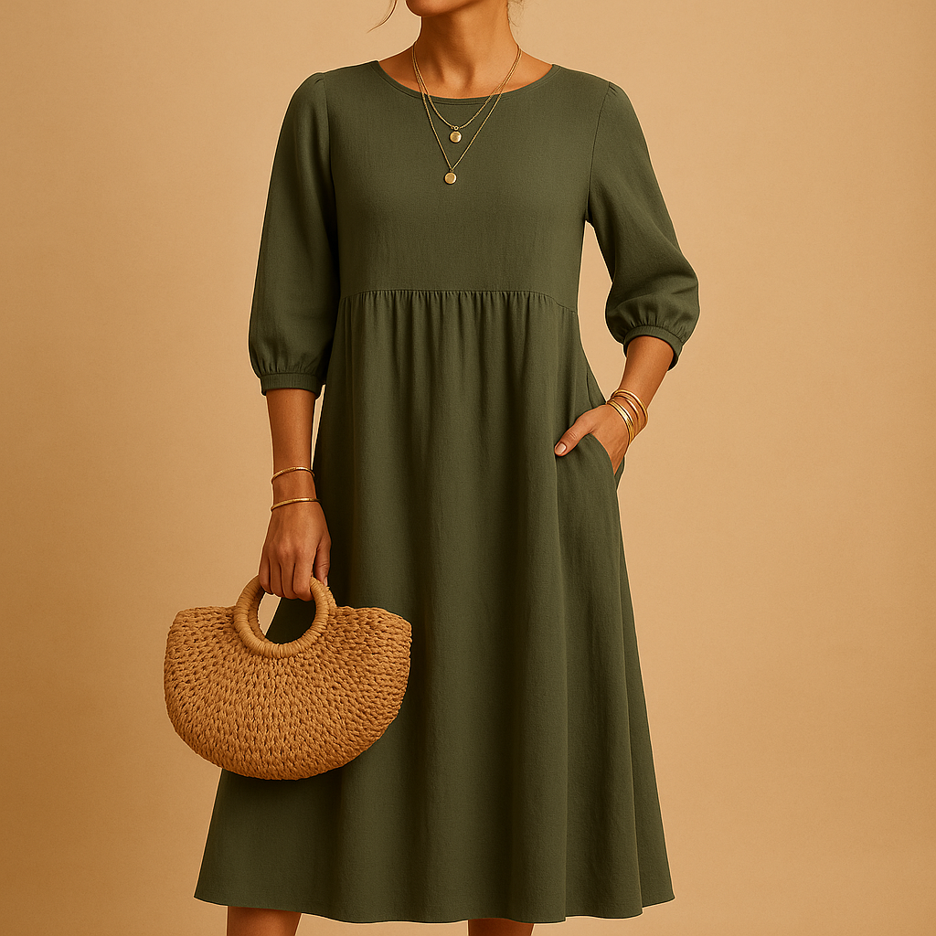 Long plain women's dress with round neckline.