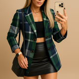 Long quilted women's blazer with check pattern.