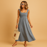 Long sleeveless summer dress with an elegant fit for women.