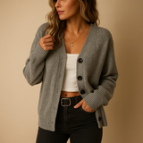 Lightweight knitted women's cardigan with hood.