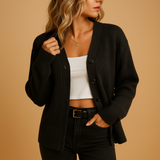 Lightweight knitted women's cardigan with hood.