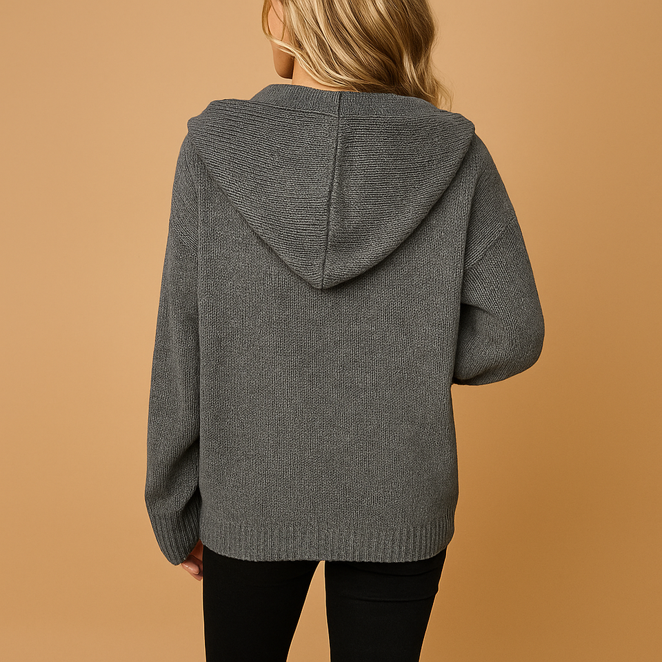 Loose-fitting women's cardigan with open front.