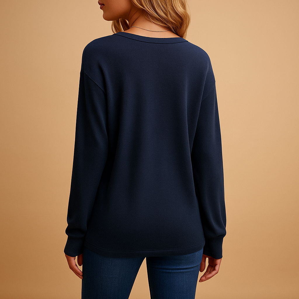 Loose-fitting blouse with V-neck and button details for women