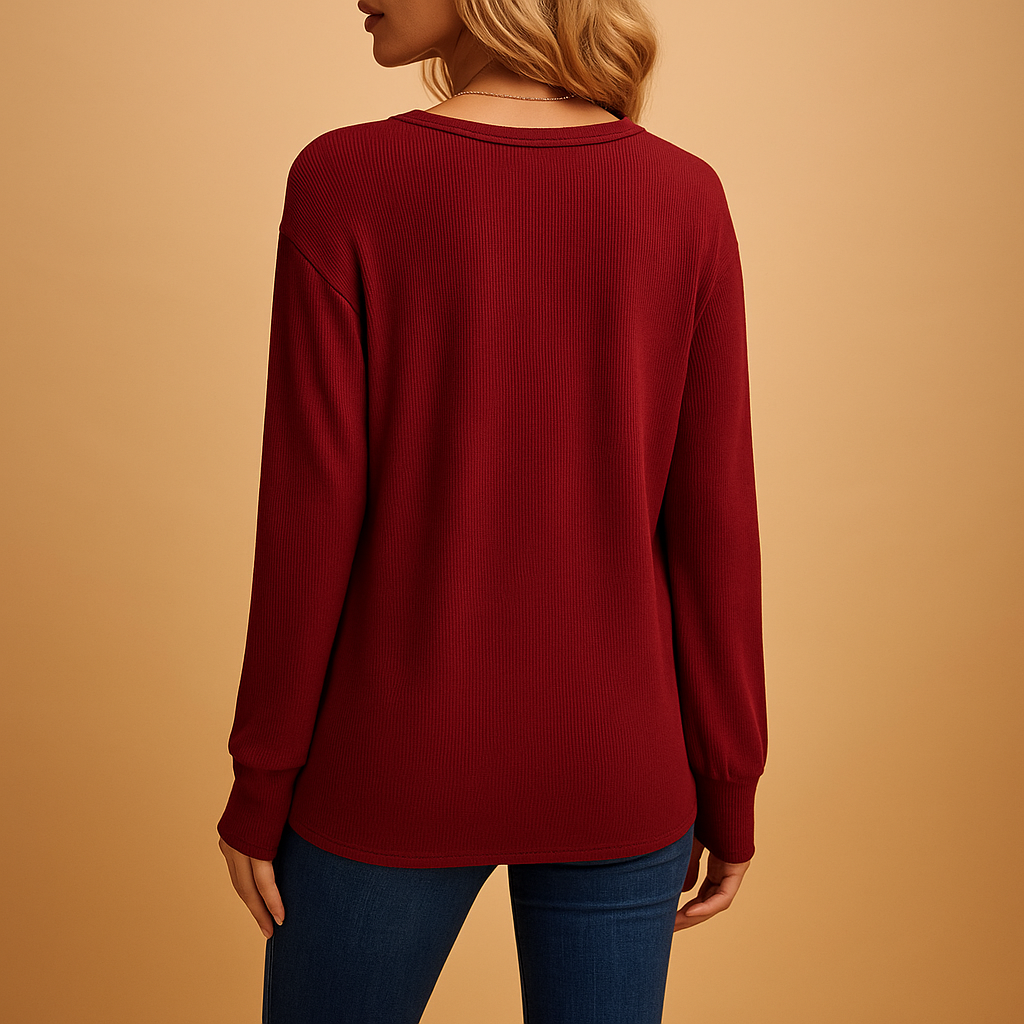 Loose-fitting blouse with V-neck and button details for women