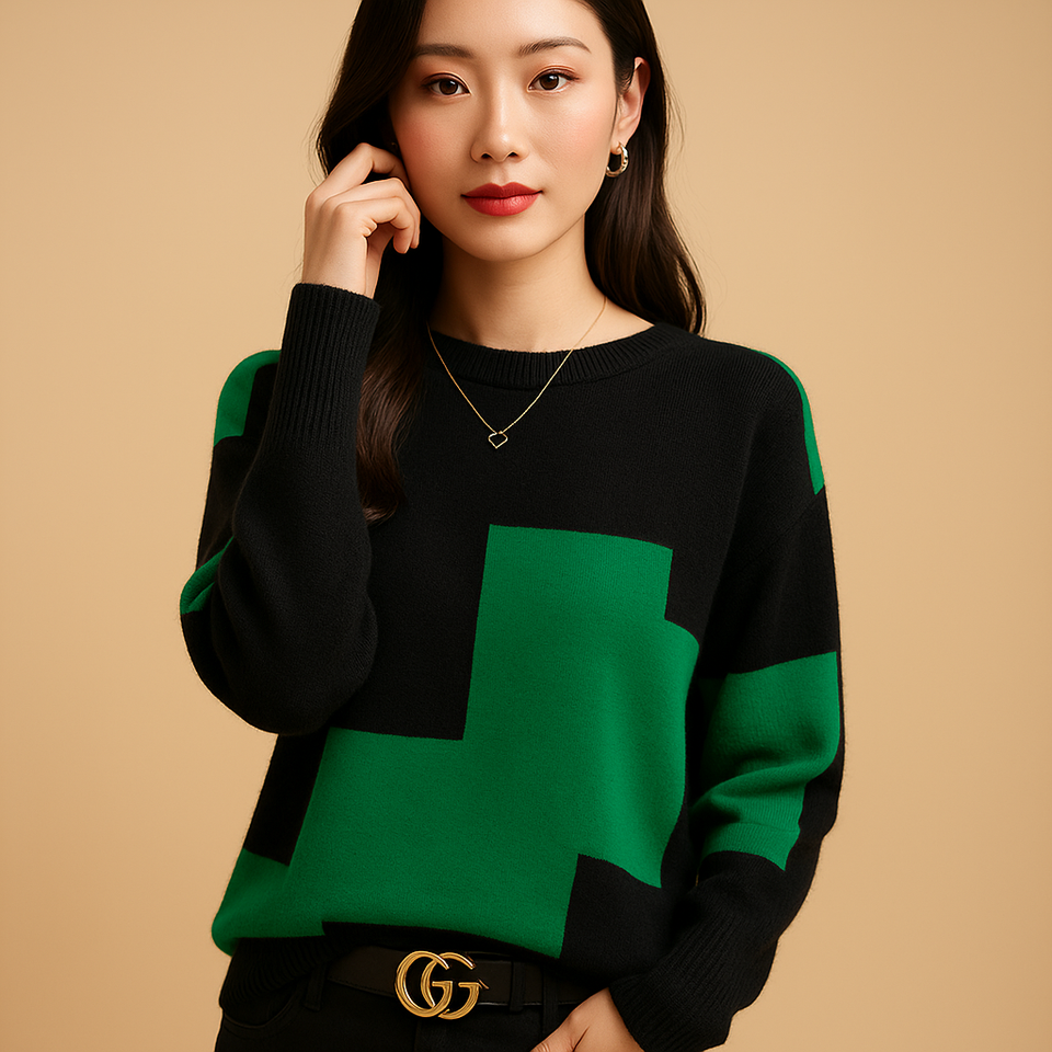 Loose-fitting women's sweater with an elegant fit and minimalist design.