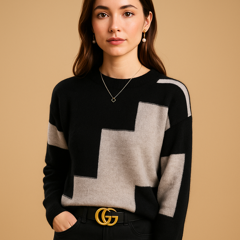 Loose-fitting women's sweater with an elegant fit and minimalist design.