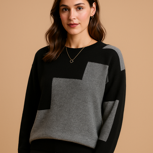 Loose-fitting women's sweater with an elegant fit and minimalist design.
