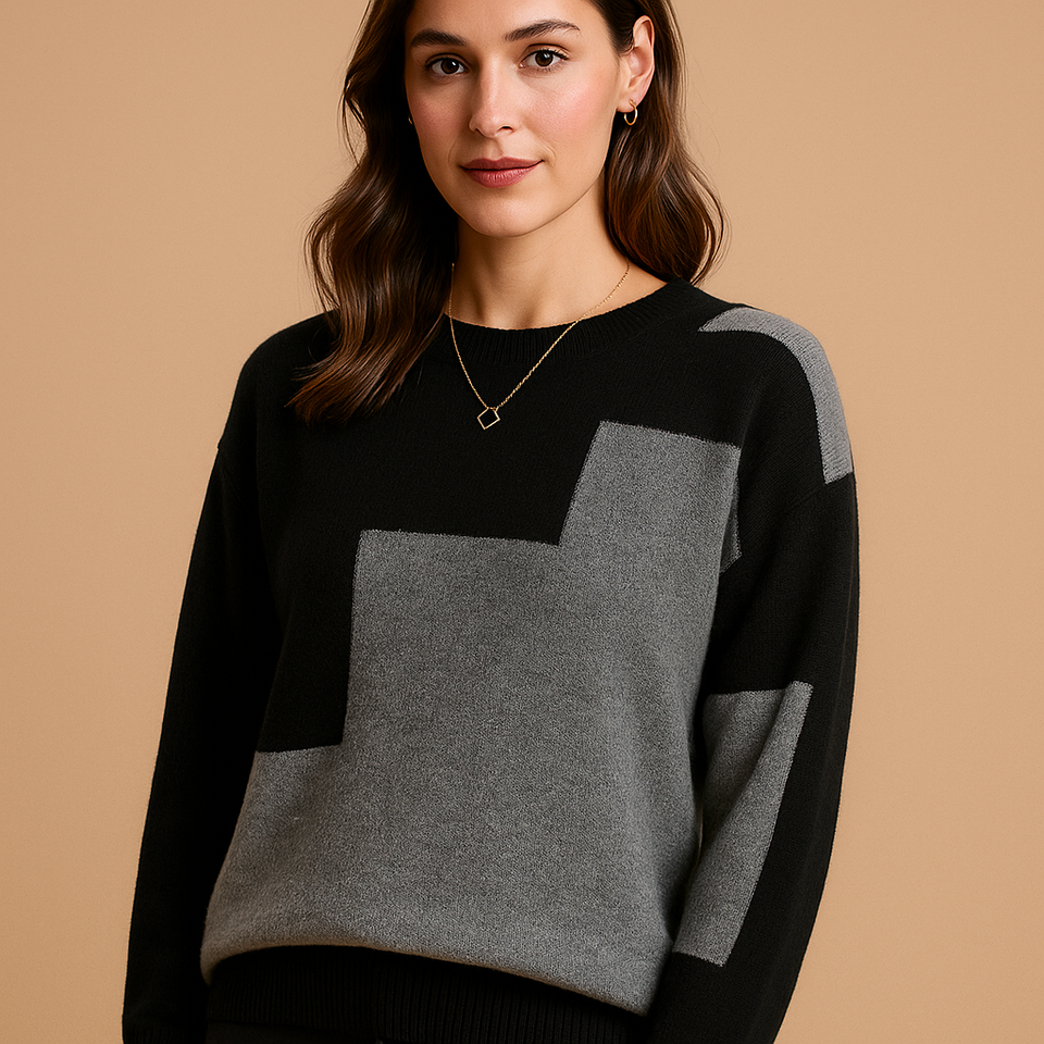Loose-fitting women's sweater with an elegant fit and minimalist design.