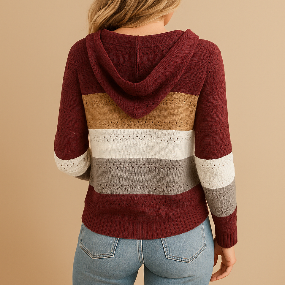 Loose-fitting V-neck women's sweater made from breathable knit fabric.