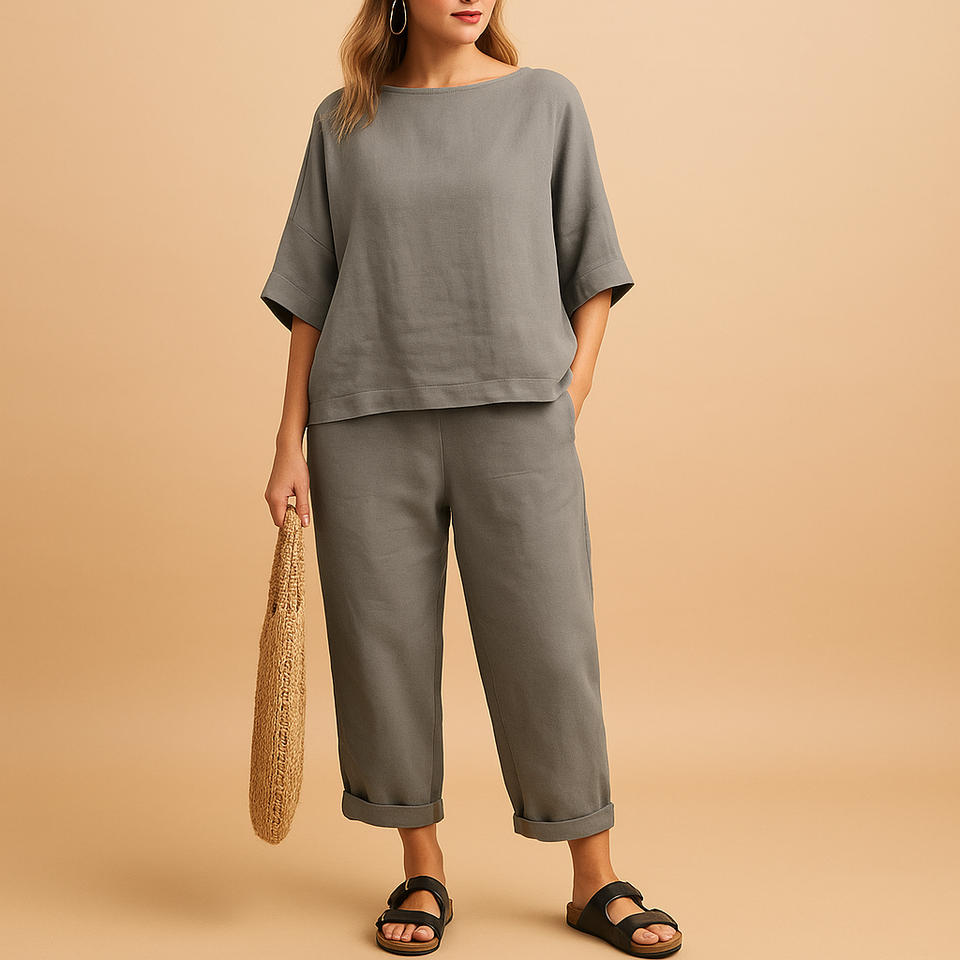 Lightweight women's set with loose-fitting shirt and ankle-length pants.