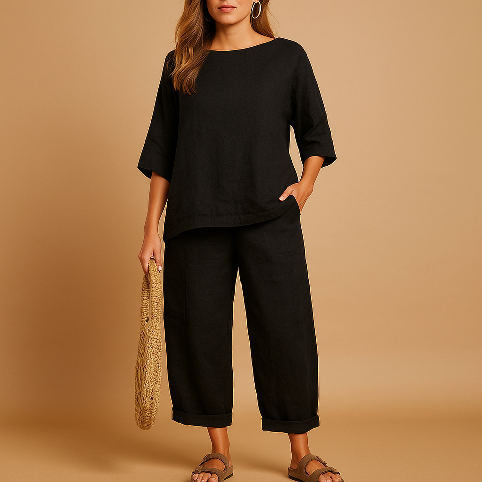 Lightweight women's set with loose-fitting shirt and ankle-length pants.