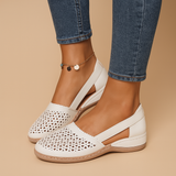 Lightweight slip-on shoes with cutouts for women.
