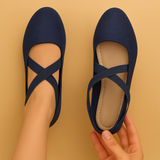 Lightweight wedge heels with decorative studs for women.