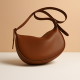 Minimalist crossbody bag made of soft PU leather for women.