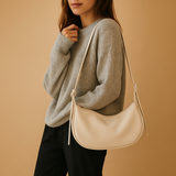 Minimalist crossbody bag made of soft PU leather for women.