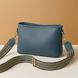 Modern sling bag with adjustable strap for women.
