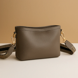 Modern sling bag with adjustable strap for women.