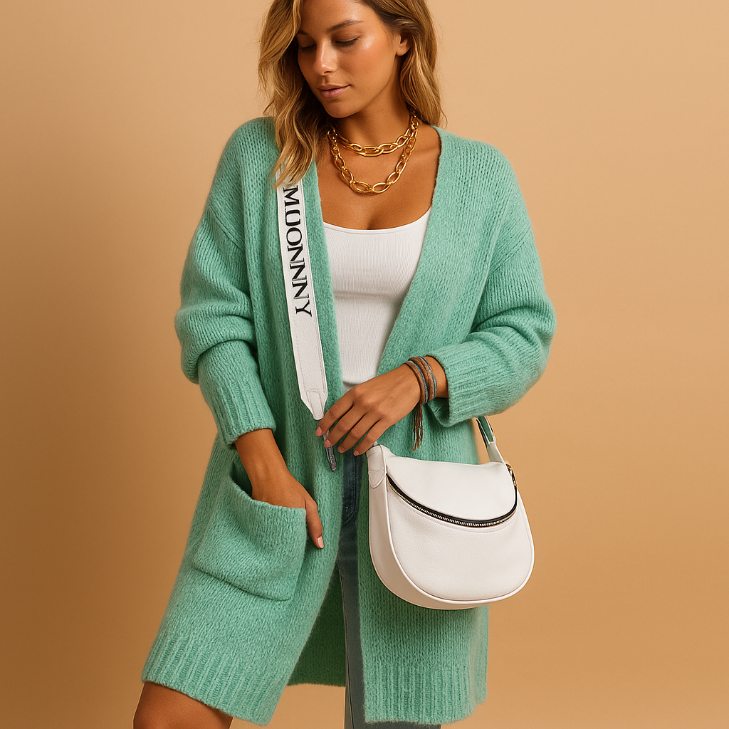Oversized women's cardigan with open front and elegant cut.